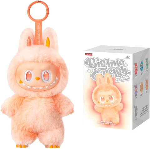 Plush toy with a keychain attachment and its packaging on a white background