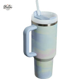 Gradient tumbler with handle and straw on a white background, featuring the Bella brand.