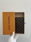 Louis Vuitton box with a checkered pattern on a plain background