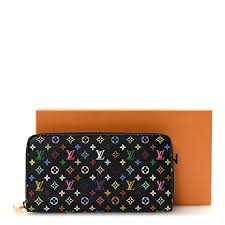 Multicolor monogram wallet with orange pouch on a white background