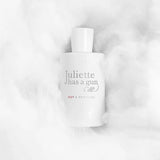 Perfume bottle labeled 'Juliette has a gun Not a Perfume' on a light gray background