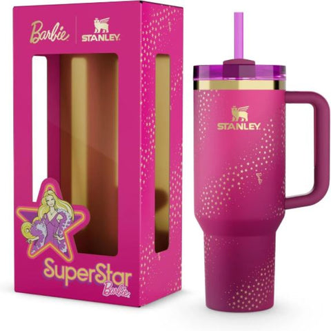 Pink Stanley tumbler with star pattern next to a Barbie-themed packaging box