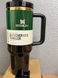 Stanley mug with a label on a white background