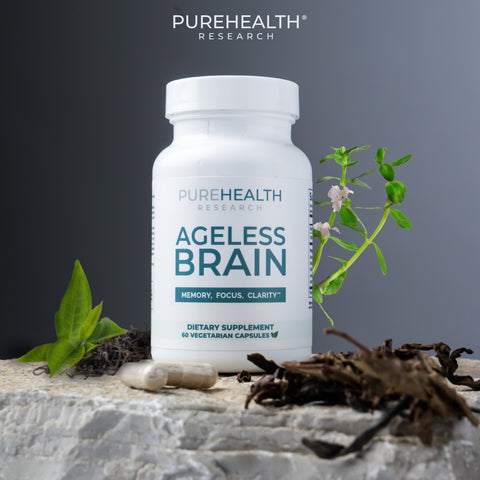 Supplement bottle labeled 'Ageless Brain' by PureHealth Research on a natural background with plants.