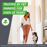 Woman walking a dog with text about trust in pet products over 20 years.